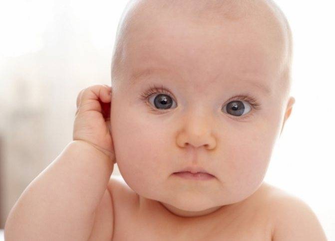 Шишка за ухом у ребенка — причины появления