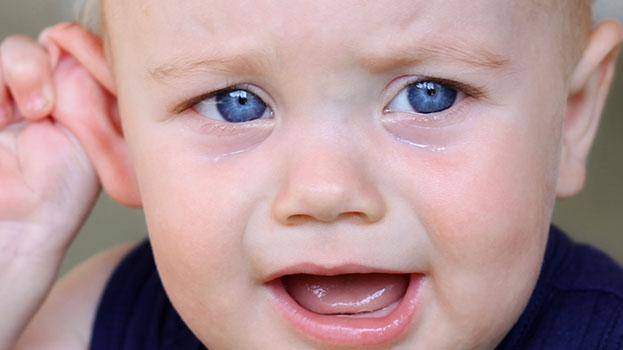 От чего может появиться шишка за ухом у ребенка и как от нее избавиться